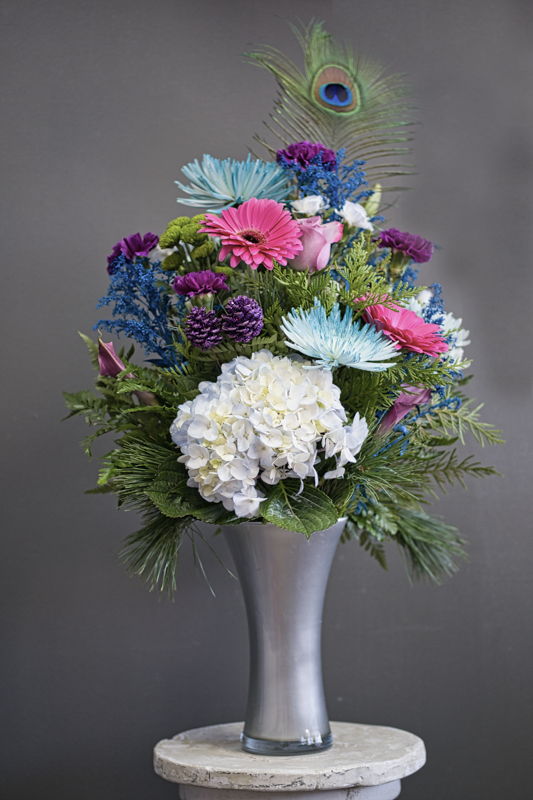 Silver Vase with tropical Christmas Flowers