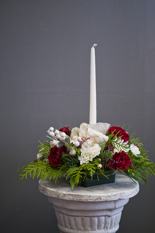 Christmas flowers with candle